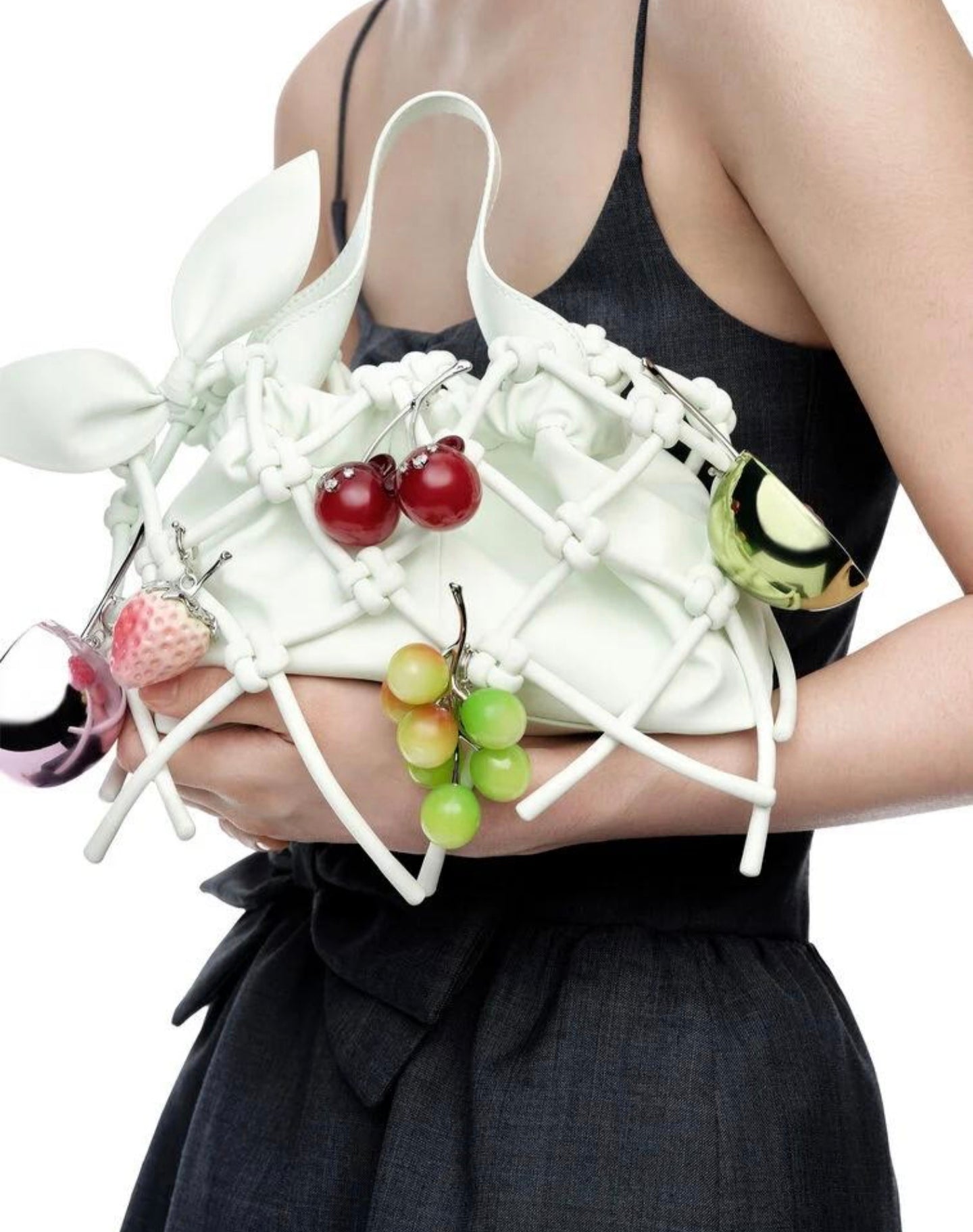 Charles & Keith SS26: Fruit Bags and Woven Textures Define Summer Luxury